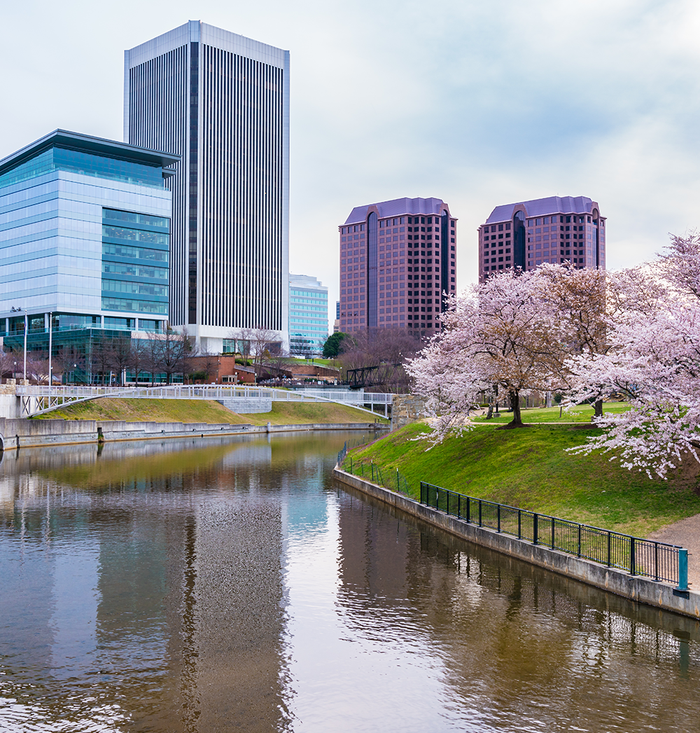downtown Richmond, Virginia skyline with cherry blossom trees blooming