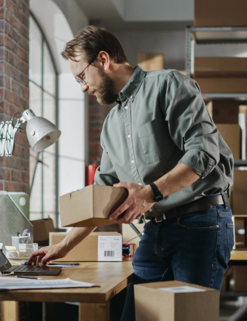 a small business owner ships a package